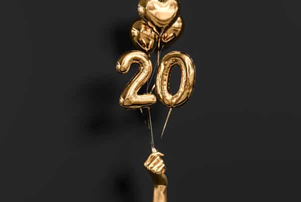20 years old. Gold and black Number 20th anniversary,