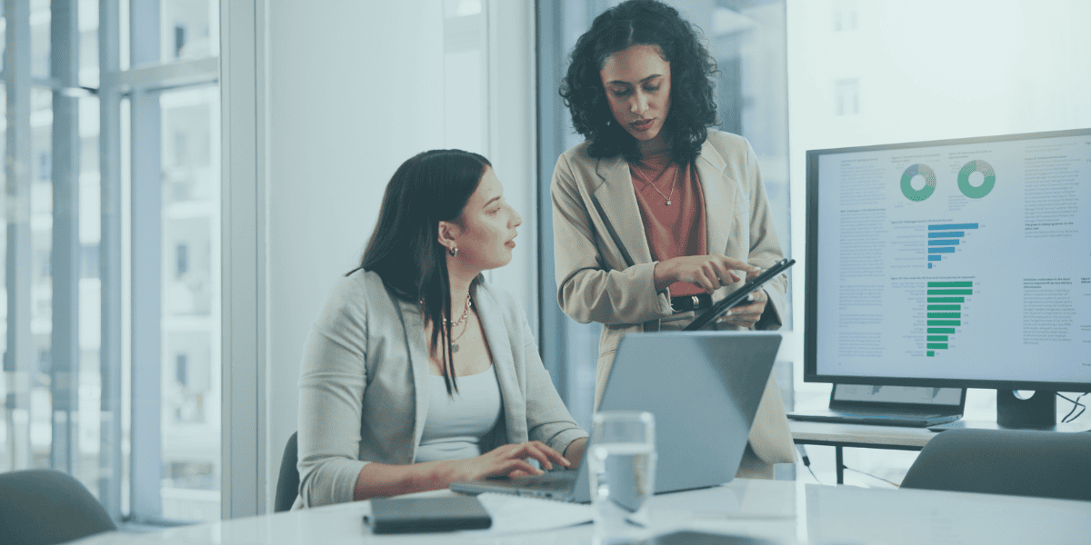 Business women reviewing timesheet financing