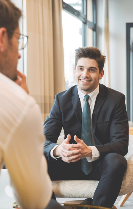 Businessman smiling in meeting