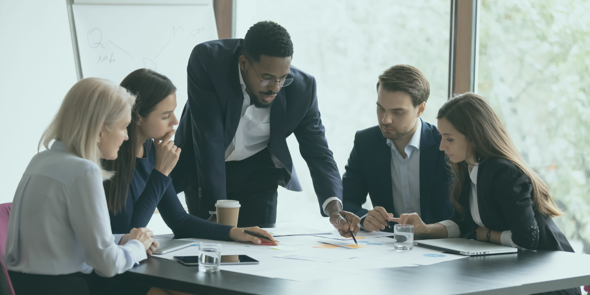 A business meeting discussing restructuring and turnaround financing options.