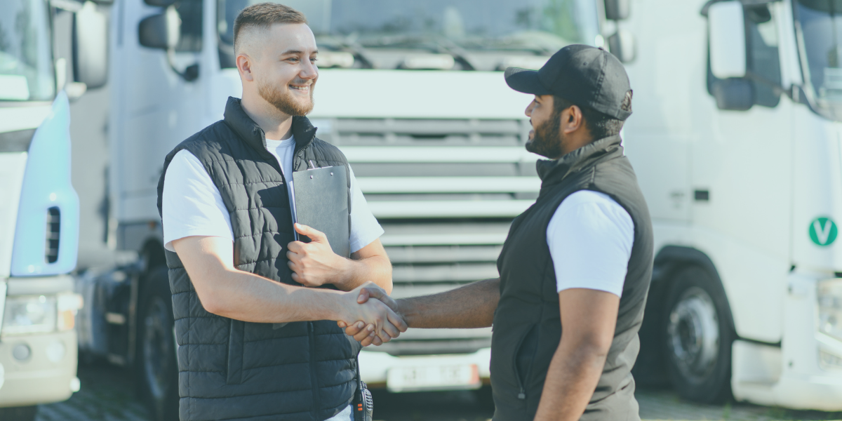 Transportation operators shaking hands.