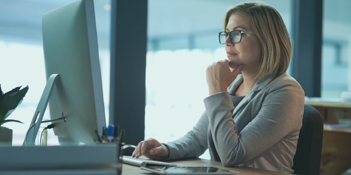 Finance professional reviewing ERP financial data to improve cash flow visibility and working capital optimization